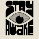 Stay Awake bold type design with a big eye in the middle of the two words in blacvk